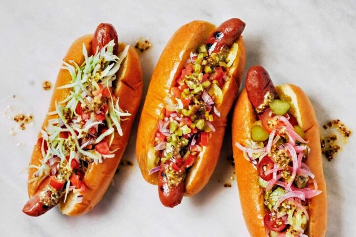 Tres perros calientes o hot dogs